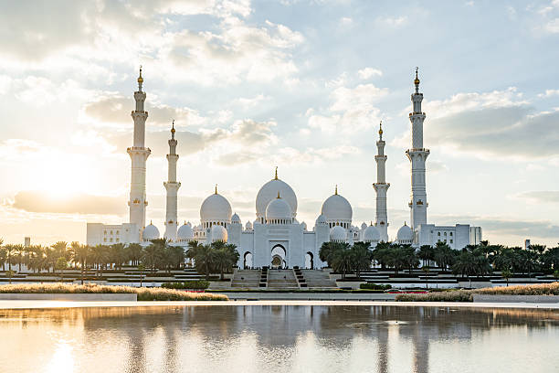 istock Sheikh zayed grand mosque reflecting at sunset in abu dhabi 2202799131