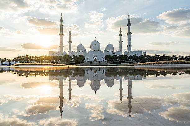 istock Sheikh zayed grand mosque reflecting at sunset in abu dhabi 2202799139