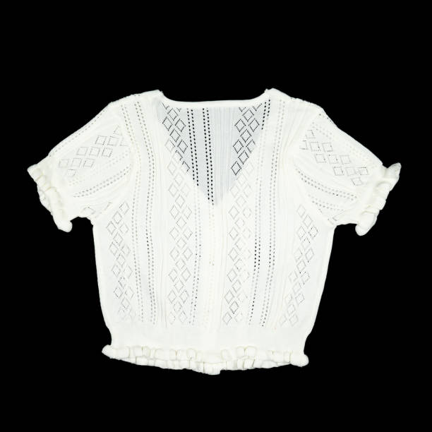 istock flat White knitwear sweater tshirt shape on black background with studio light. Clipping Paths. 2202804338