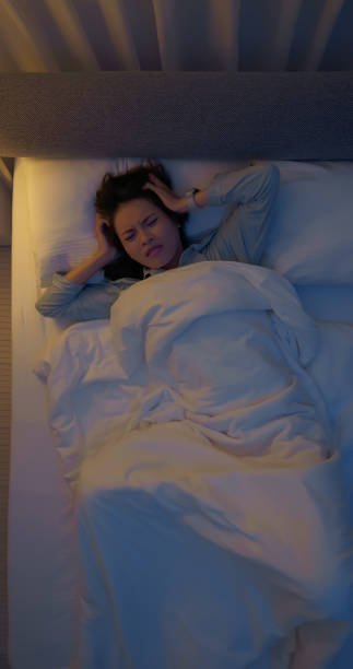 istock asian woman poor sleep quality 2202806475