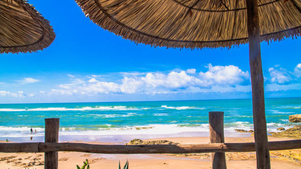 istock View from a shaded terrace overlooking a paradisiacal beach in Asilah, Morocco. 2202808036
