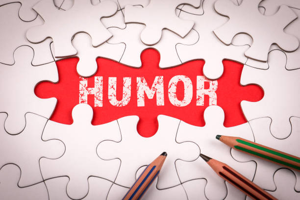 istock HUMOR. White puzzle pieces and colored pencils 2202808189