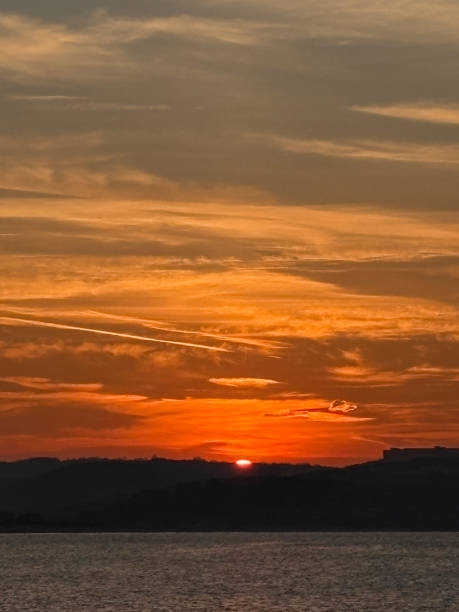 istock Sunset. Sun, sea and sky background 2202808925