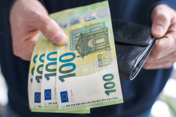 istock Payment in European currency, savings from your wallet. 2202811132