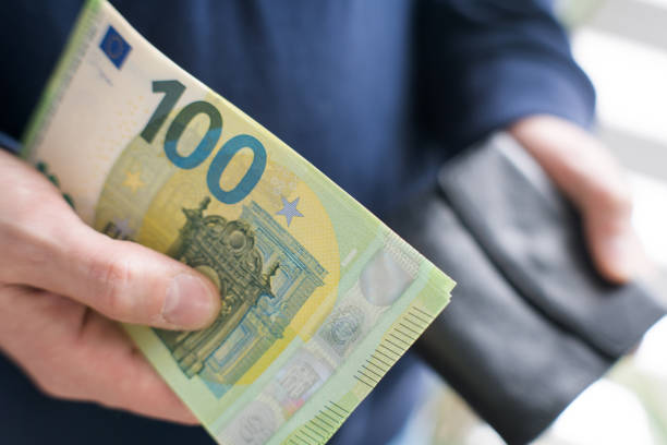 istock Payment in European currency, savings from your wallet. 2202811165