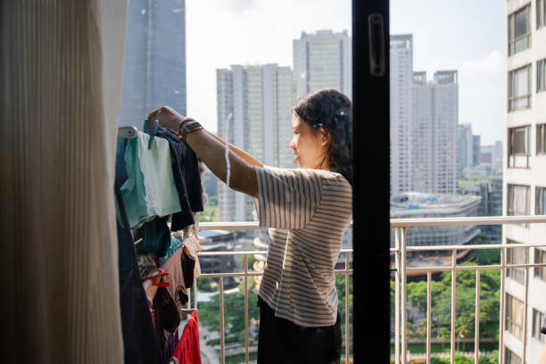 White sheets and towels hanging on clotheslines