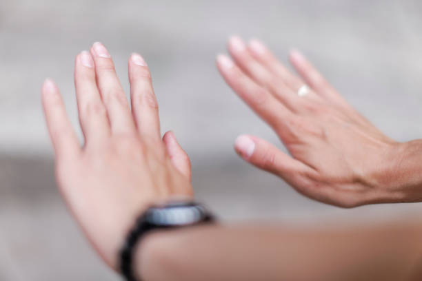 istock Close-Up of Young Woman's Hands with Nails, Daylight, Top View 2202813635