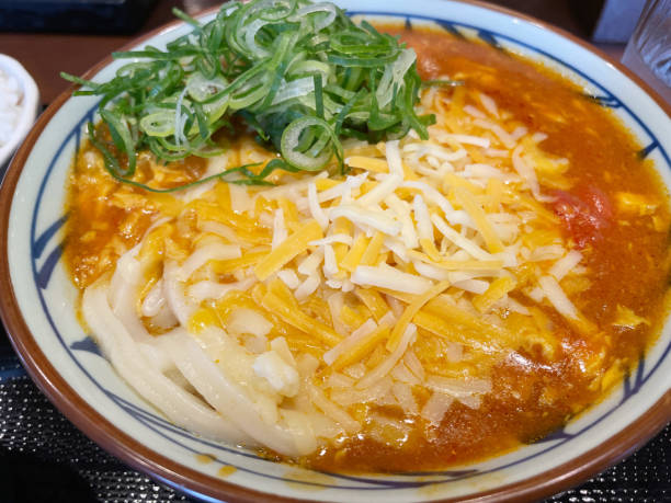 istock Curry udon with tomato and cheese 2202813639