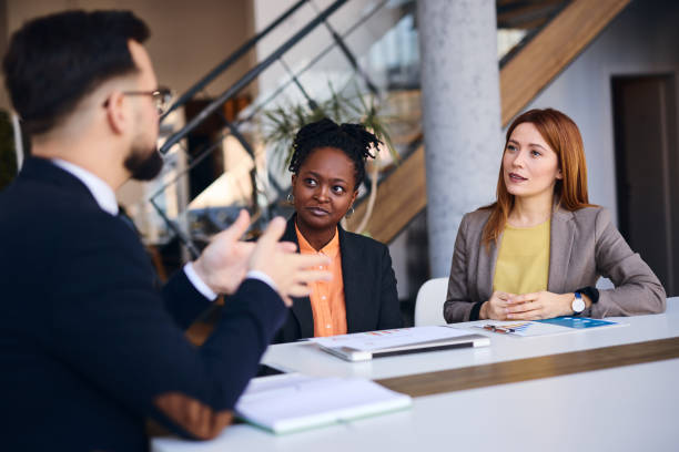 istock Business team discussing during a meeting in a modern office 2202814250