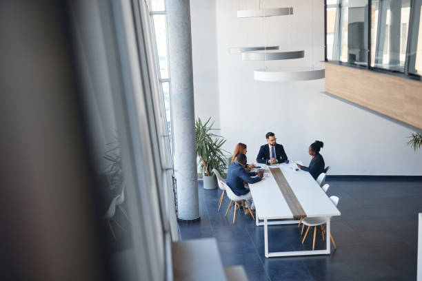 istock Business team discussing during a meeting in a modern office 2202814371