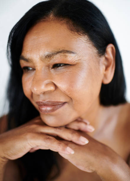 istock Thoughtful Mature Woman with Gentle Smile 2202814883