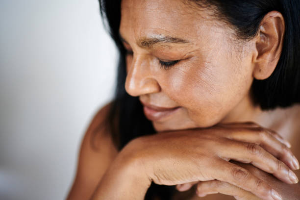 Peaceful Mature Woman with Eyes Closed and Relaxed Posture