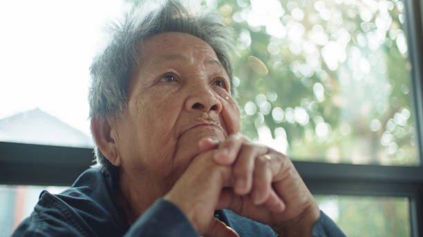 istock Senior woman contemplation alone. 2202817616