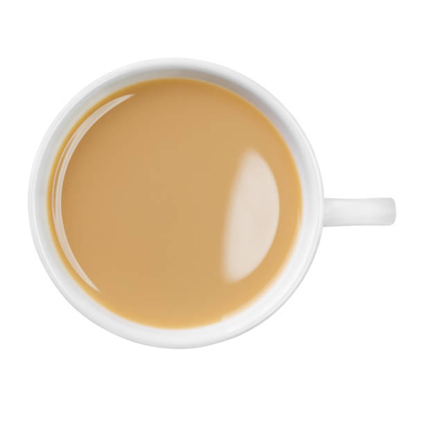 istock White ceramic cup containing tea or coffee with milk isolated on white background top view 2202823983