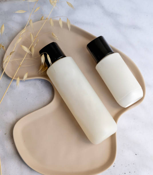 istock Face cleanser and face tonic on a shadows background 2202825746