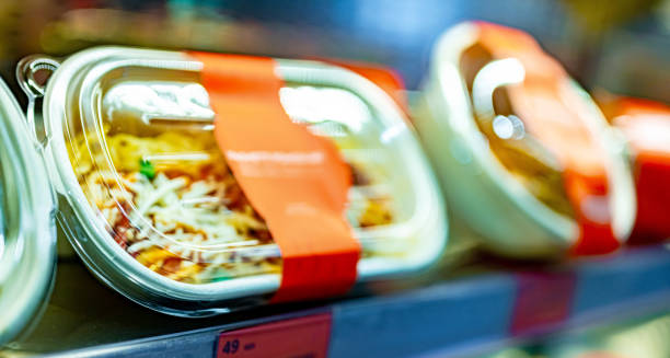 Pre-packaged meals displayed in a commercial refrigerator
