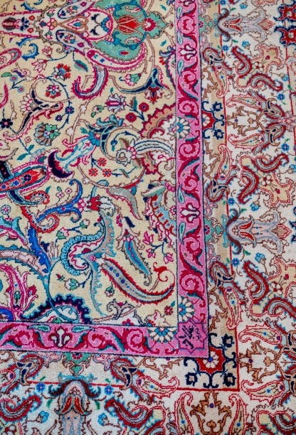 istock Persian Carpet texture with pink and blue ornaments 2202833033
