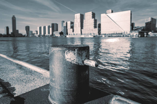 A boulder, with the skyline of Rotterdam in the Background. Rotterdam, Netherlands.