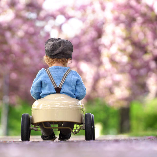 istock driving the pedal car 2202835171