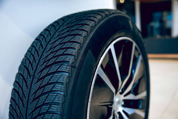 istock Tires for professional mechanic changing 2202840124