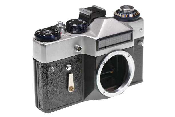 istock Vintage 35mm film camera without a lens isolated on white 2202840786