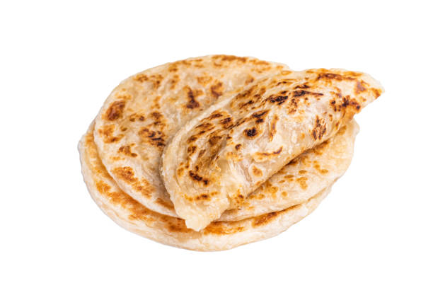 istock Aloo Paratha Indian Potato stuffed Flatbread isolated on white background. top view 2202843259