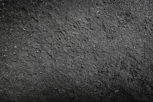 istock texture of wet black volcanic sand 2202846173