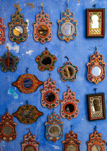 Decorative Mirrors on Blue Wall in Chefchaouen, Morocco