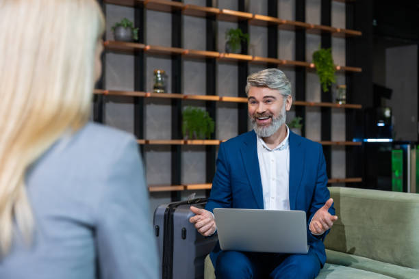 istock Mature business man having an interview with a work candidate and looking involved 2202847027