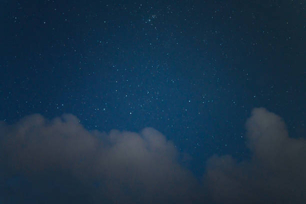 istock Wide angle view cloudy night sky starry night over the mountain with milky way background 2202848239