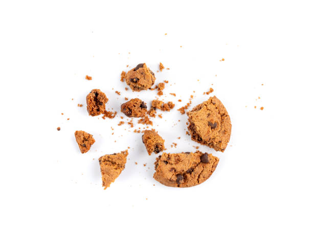 istock Chocolate chips cookies isolated, broken American biscuits, cocoa cake, sweet morsels bakery 2202856345