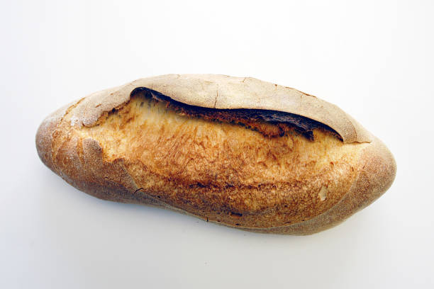 istock Senatore Cappelli bread is a loaf of bread made with the typical Senatore Cappelli durum wheat flour cooked in South of Italy 2202862559