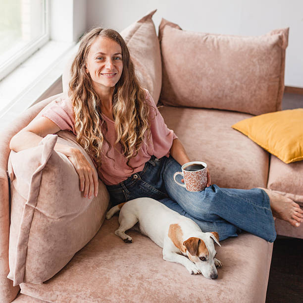 istock Calm and peaceful middle-aged woman takes a cup 2202862615