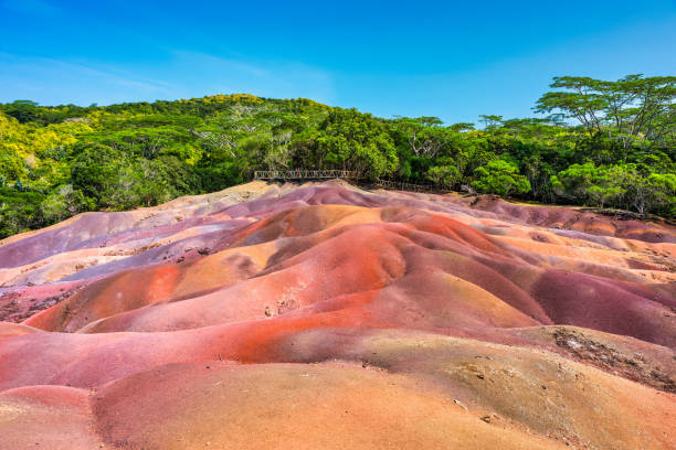 istock Chamarel Seven Colored Earth Geopark in Mauritius Island. Colorful panoramic landscape about this volcanic geological formation Chamarel Seven Colored Earth Geopark in Riviere noire district. 2202864653