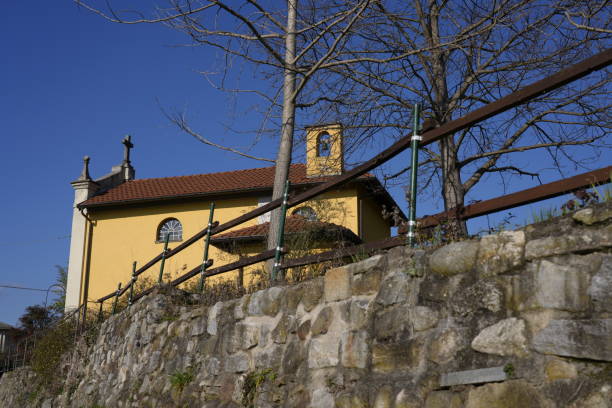 Sacro Monte di Varese  (Sacred mount of Varese) or Santa Maria del Monte, north Italy with the third arch and the eleventh chapel. The Sacro Monte of Varese is located in the Regional Park Campo dei Fiori, is one of the nine sacri monti (sacred mountains) in the Italian regions of Lombardy and Piedmont which were inscribed on the UNESCO list of World Heritage Sites in 2003. It has an altitude of 807 metres above sea-level. The old village, with its 14 Chapels winding along a pebbly path of about 2 km, is probably the most fascinating Marian itinerary in the world