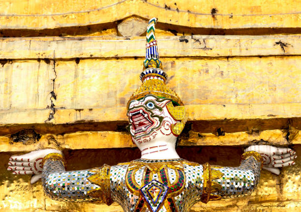 Shot in color detail on the facade of this historic building representing some character, animal or flower. Set at Bangkok, Thailand, Asia