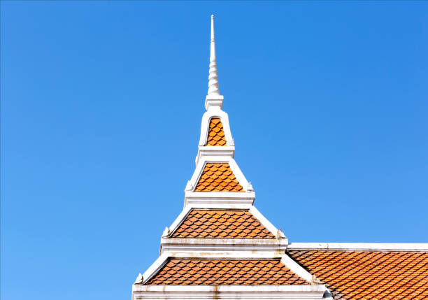 Shot in color detail on the facade of this historic building representing some character, animal or flower. Set at Bangkok, Thailand, Asia