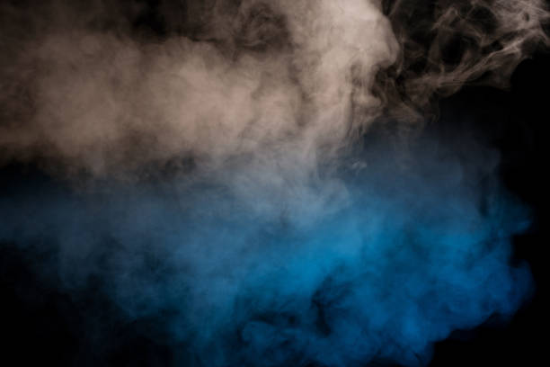 istock Blue and yellow steam on a black background. 2202870956