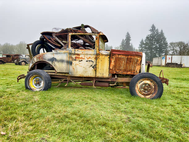 istock Rusting Yellow Pickup Truck With Junk 2202872494
