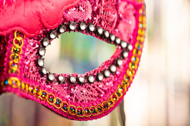 Venice, Italy - March 6, 2011: Participant woman in mask on St. Mark's Square during the Carnival of Venice. The 2011 carnival was held from February 26th to March 8th