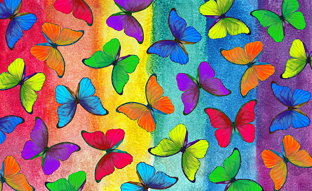 istock Colors of rainbow. Pattern of multicolored morpho butterflies. Abstract colorful pattern. Multicolored watercolor stains. 2202890809