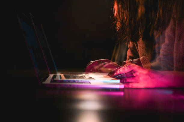 Triple Exposure woman working at laptop.