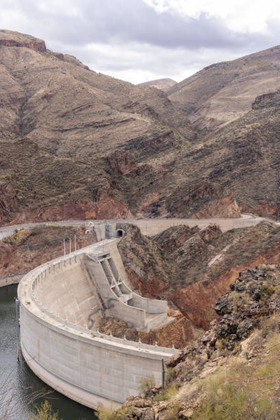 istock Elevated view of dam in desert landscape 2202895607