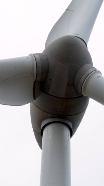 istock Wind turbine generating clean energy under a clear sky 2202897679