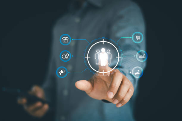istock Businessman touch on screen to target customer. Target customer, buyer persona, customer behavior concept. Marketing plan and strategies. Personalization marketing, customer centric strategies. 2202900913