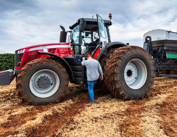 istock Modern Planting Machine in Action on Farmland 2202910174