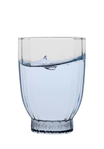 istock Water splashes gracefully in a transparent glass during a refreshing moment of hydration 2202915549