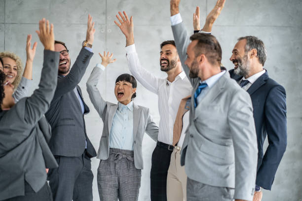 istock Excited Office Team Engaging in Enthusiastic Collaboration 2202920550