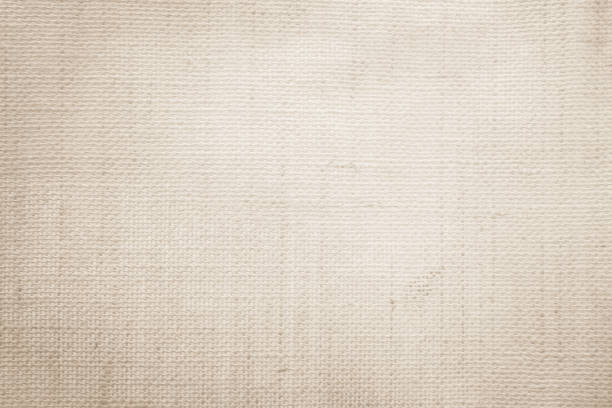 istock Brown sackcloth woven texture background in natural pattern. Jute hessian burlap, linen background in light beige cream color blank. Weaving canvas fiber line cotton cloth textured as organic. 2202921634