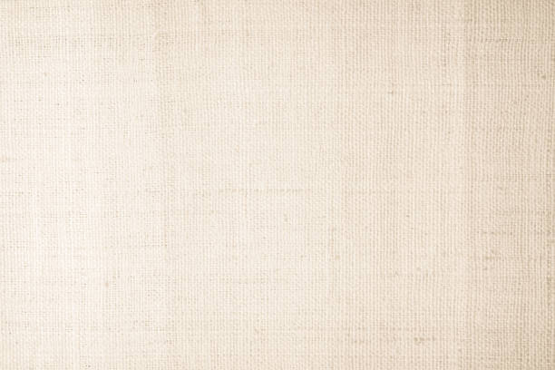 Brown sackcloth woven texture background in natural pattern. Jute hessian burlap, linen background in light beige cream color blank. Weaving canvas fiber line cotton cloth textured as organic.